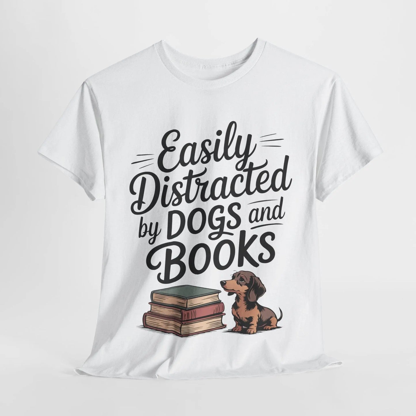 White t-shirt with 'Easily Distracted by Dogs and Books' text and a dachshund graphic on a white background