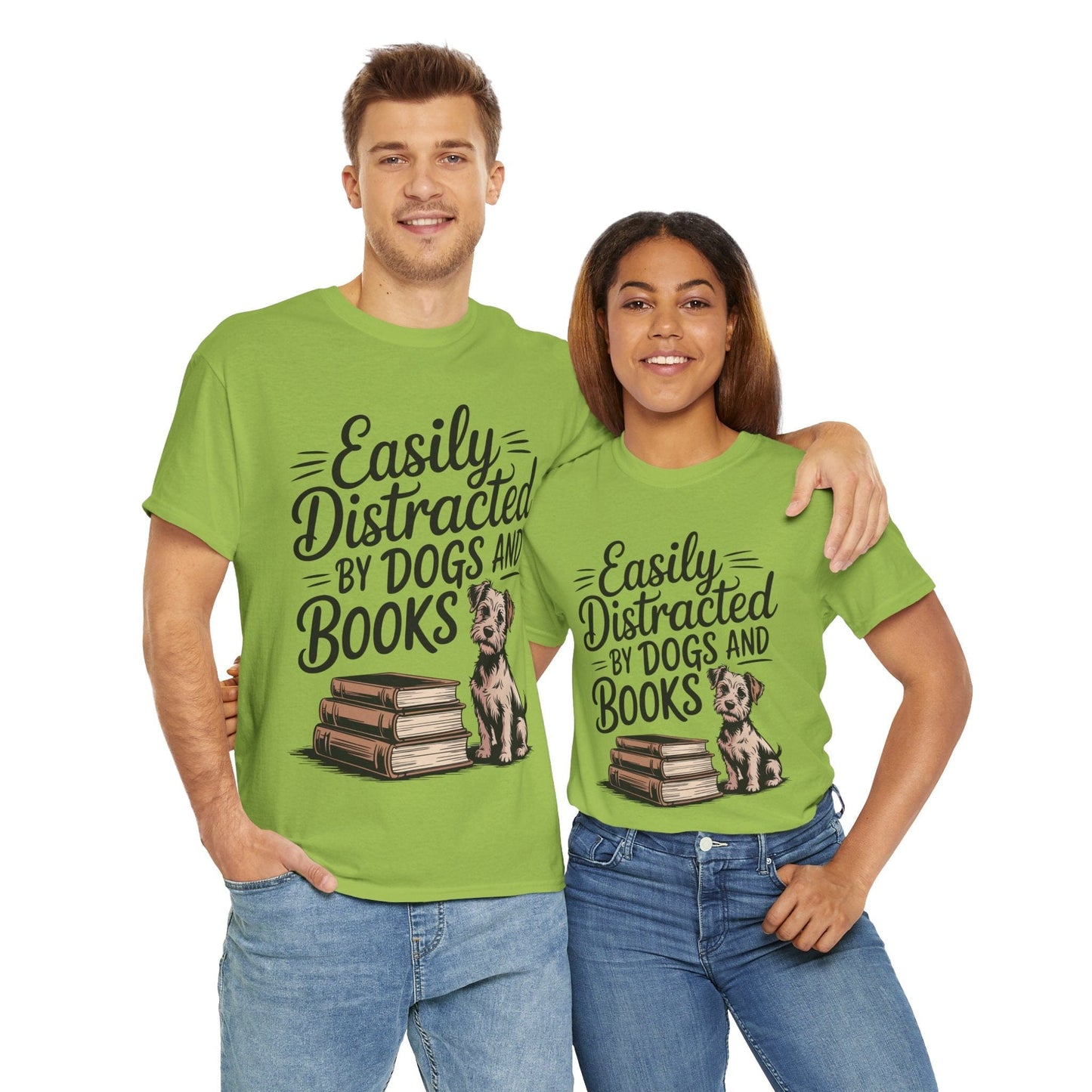 Two people wearing green t-shirts with a dog and book design and text.