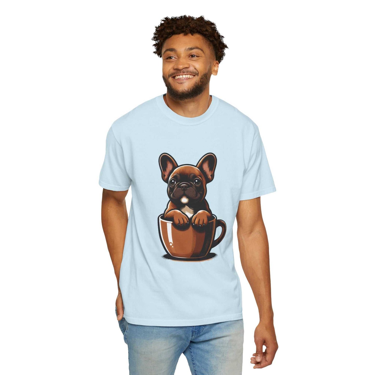 Man wearing a light blue t-shirt with a dog in a coffee cup design on a white background