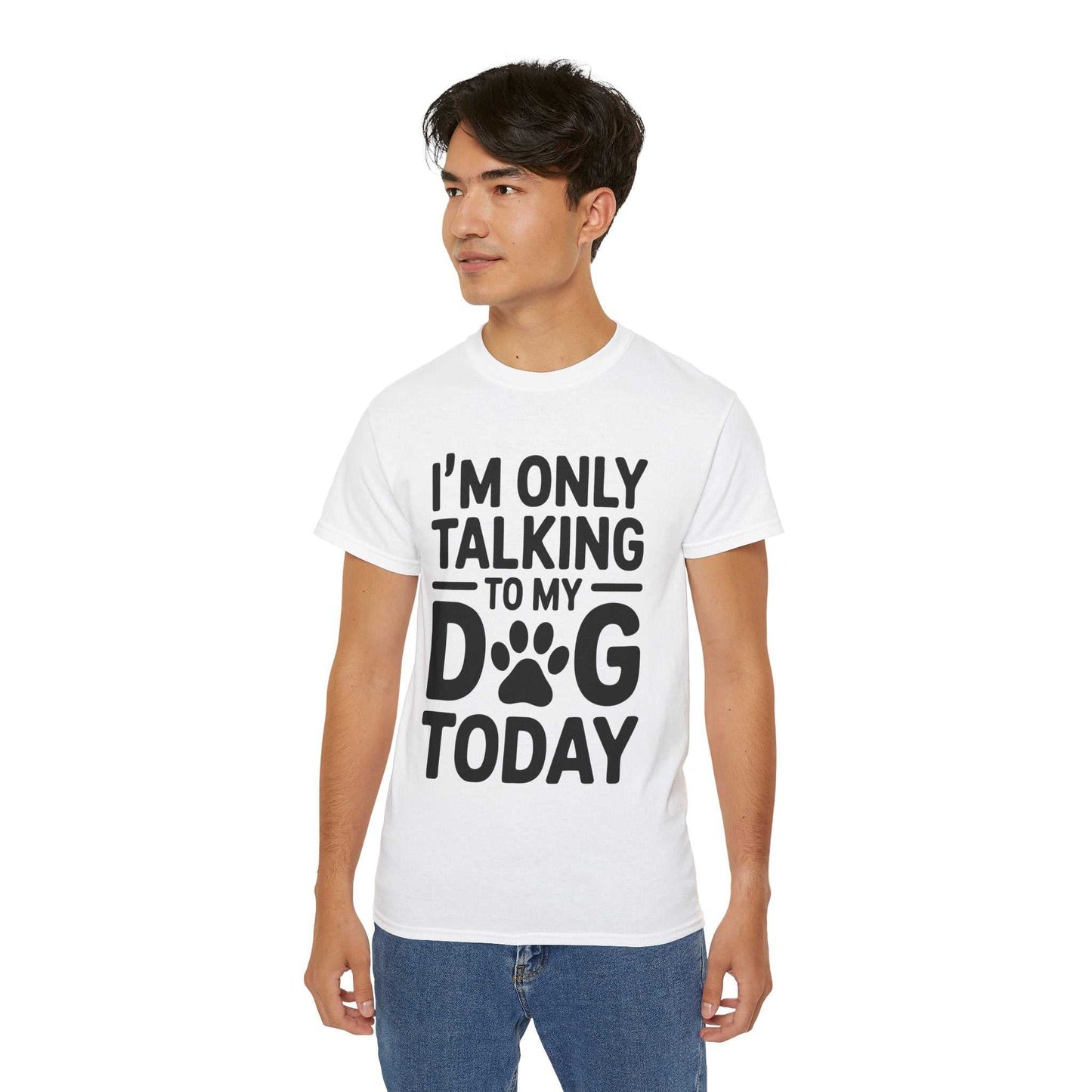 Person wearing a white t-shirt with text 'I'm only talking to my dog today' on a white background