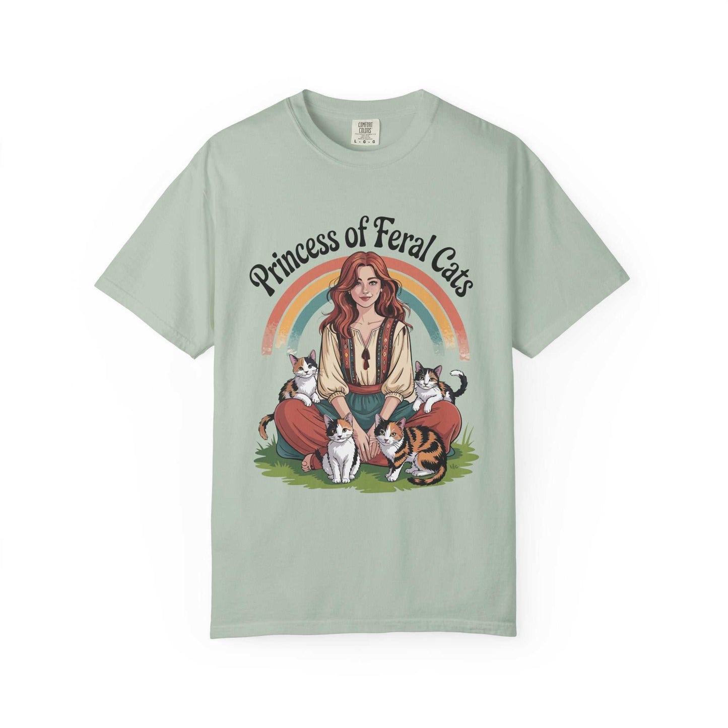Light green t-shirt with a graphic of a woman surrounded by cats and a rainbow, with 'Princess of Feral Cats' text.