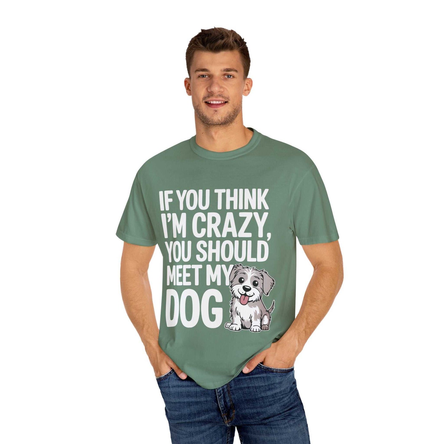 Man wearing a green t-shirt with text and a dog illustration on a white background