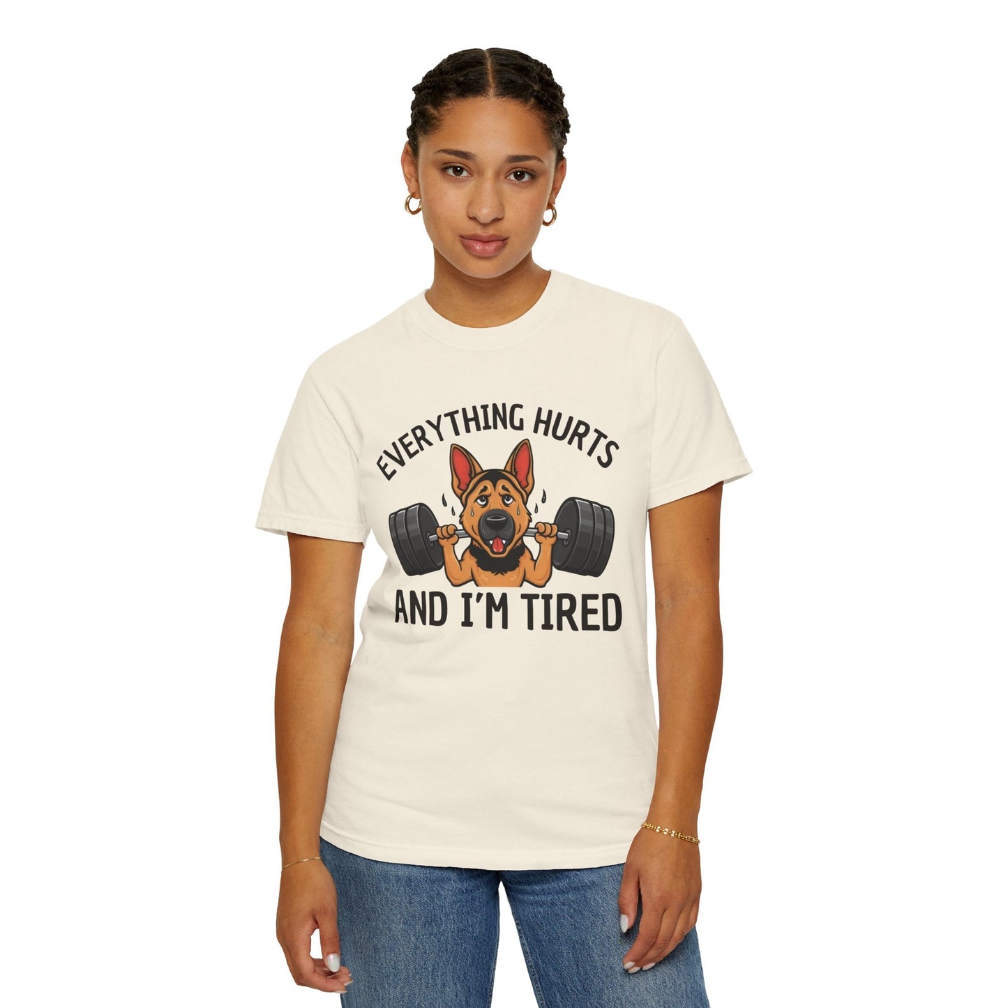 Person wearing a white t-shirt with a dog graphic and text on a white background