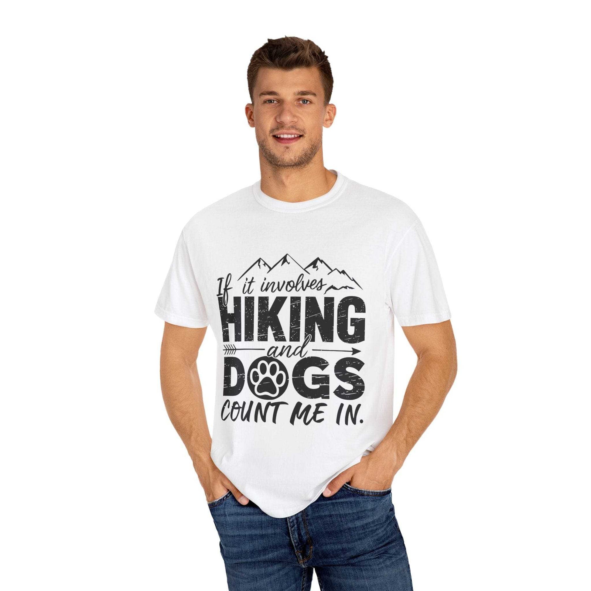 Man wearing a white t-shirt with 'Hiking and Dogs' text design on a white background