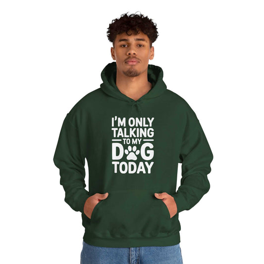 Person wearing a green hoodie with text 'I'm only talking to my dog today' on a white background