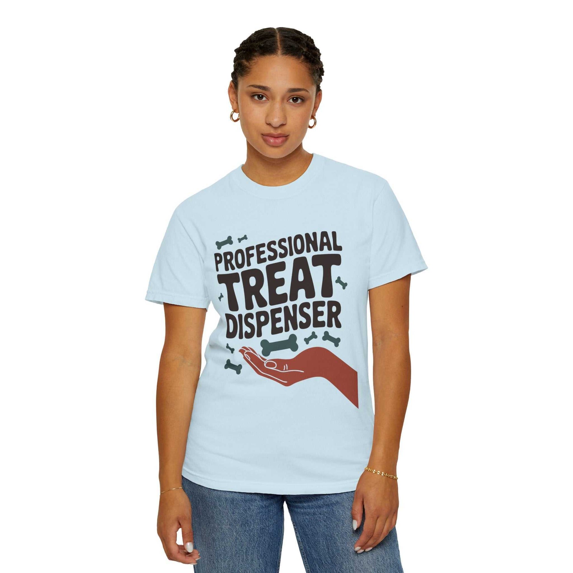 Person wearing a light blue t-shirt with 'Professional Treat Dispenser' text and graphic.