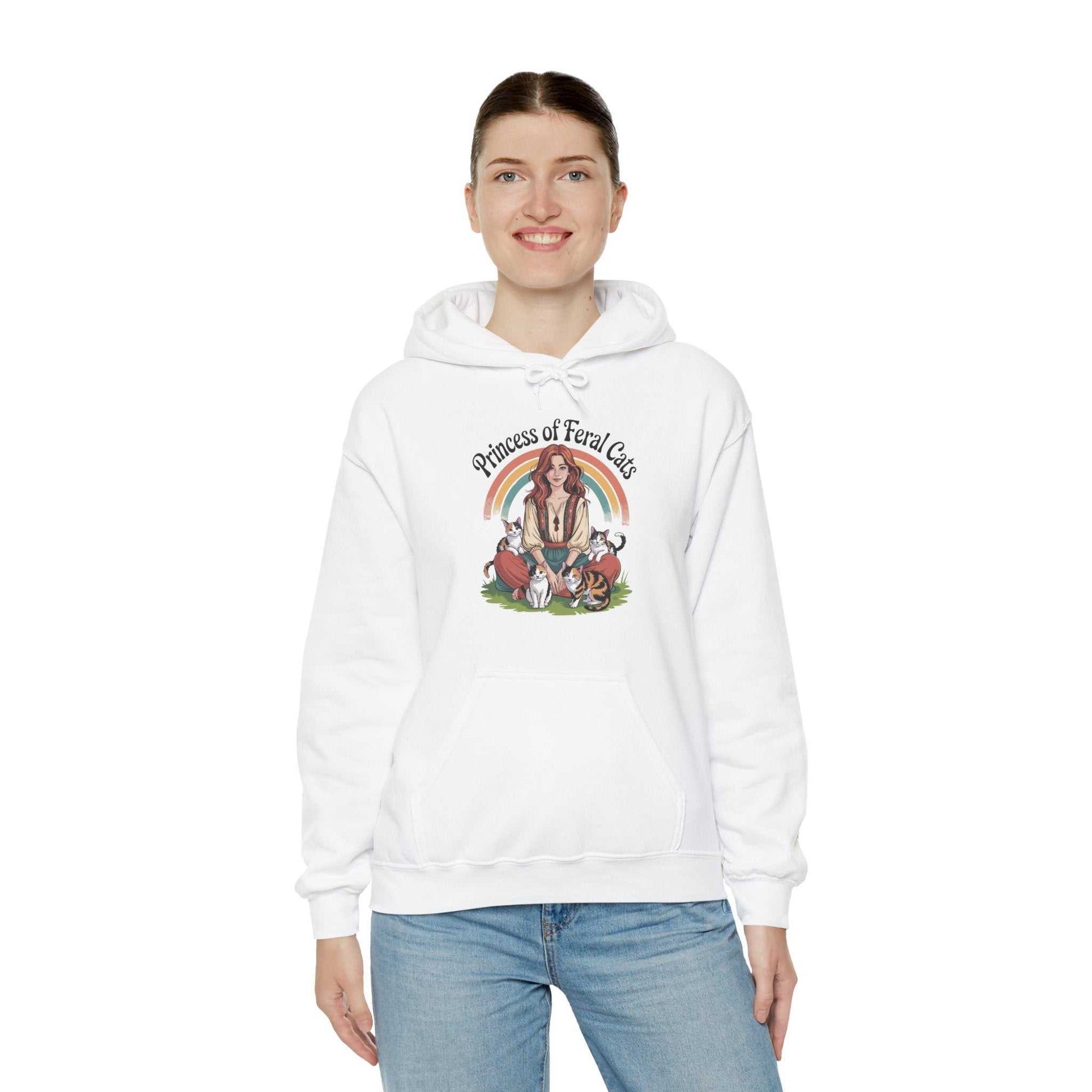 Person wearing a white hoodie with a graphic design on a white background