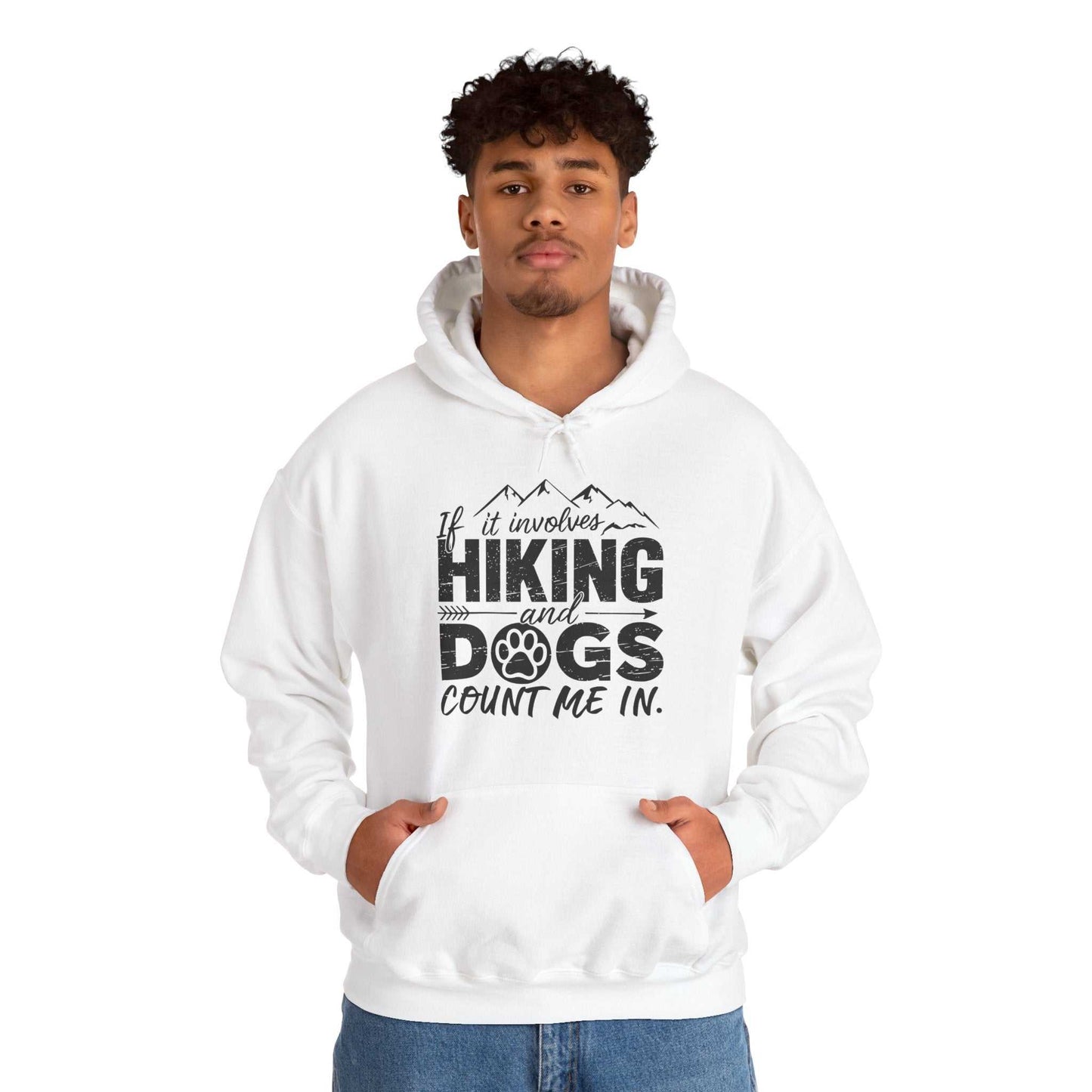 Person wearing a white hoodie with text 'If it involves hiking and dogs, count me in.' on a white background