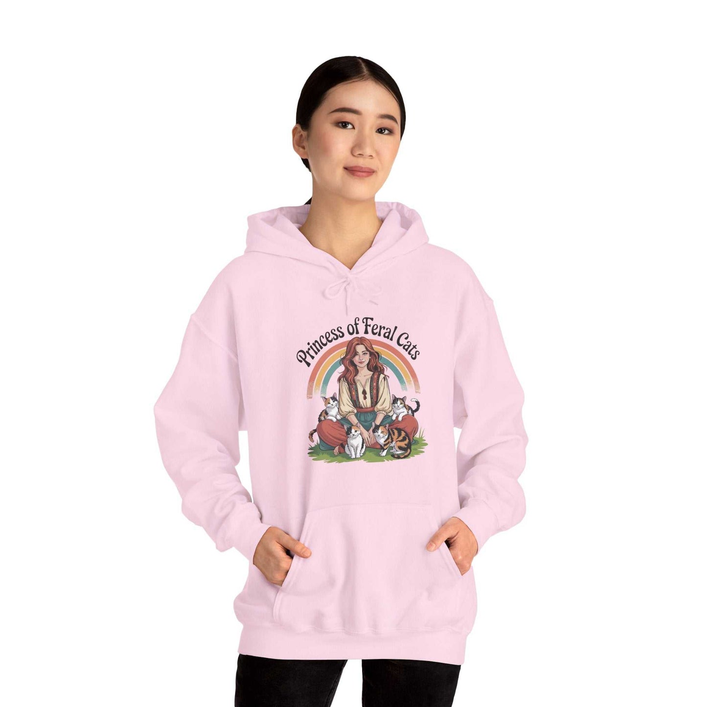 Person wearing a pink hoodie with a graphic design on a white background