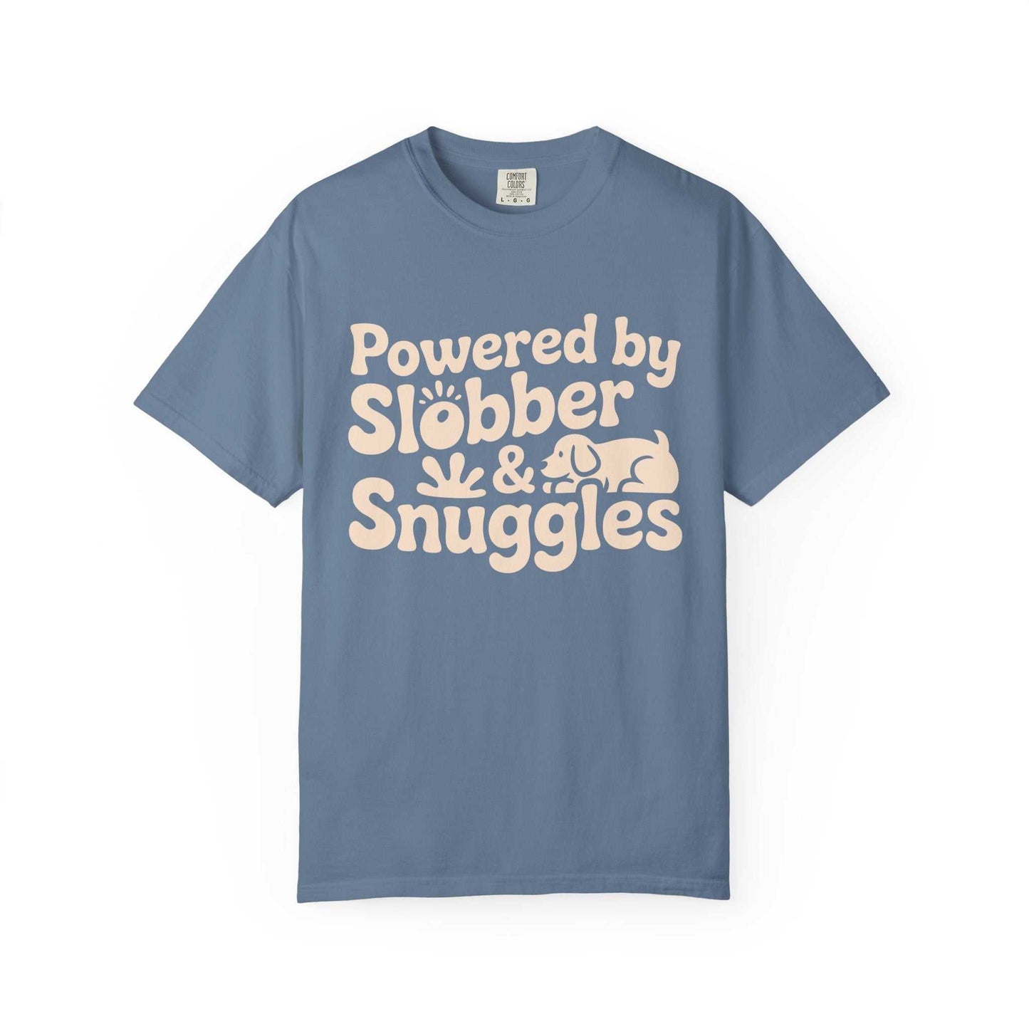 Close-up of the "Powered by Slobber & Snuggles" graphic on a black t-shirt