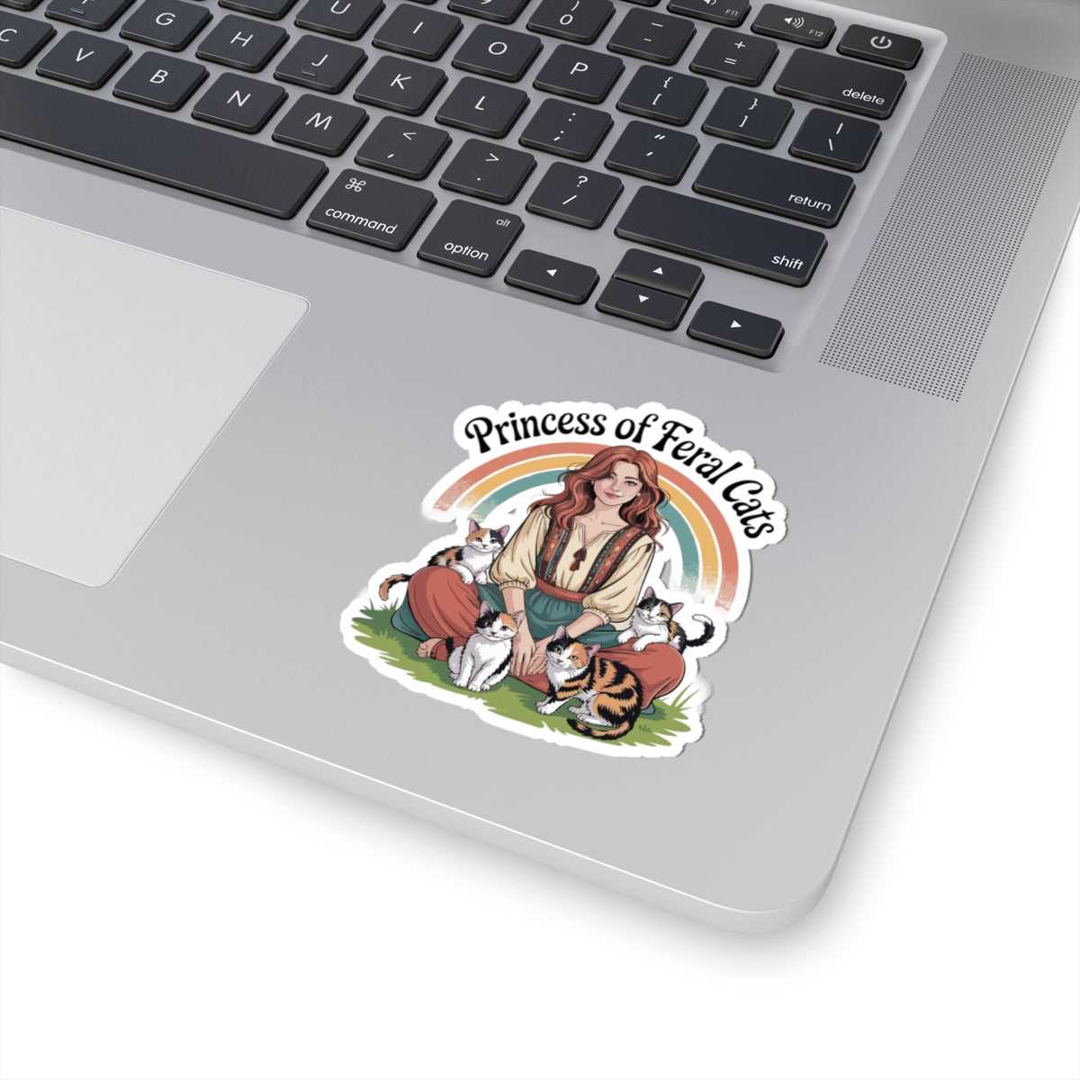 Sticker of a woman with cats on a laptop