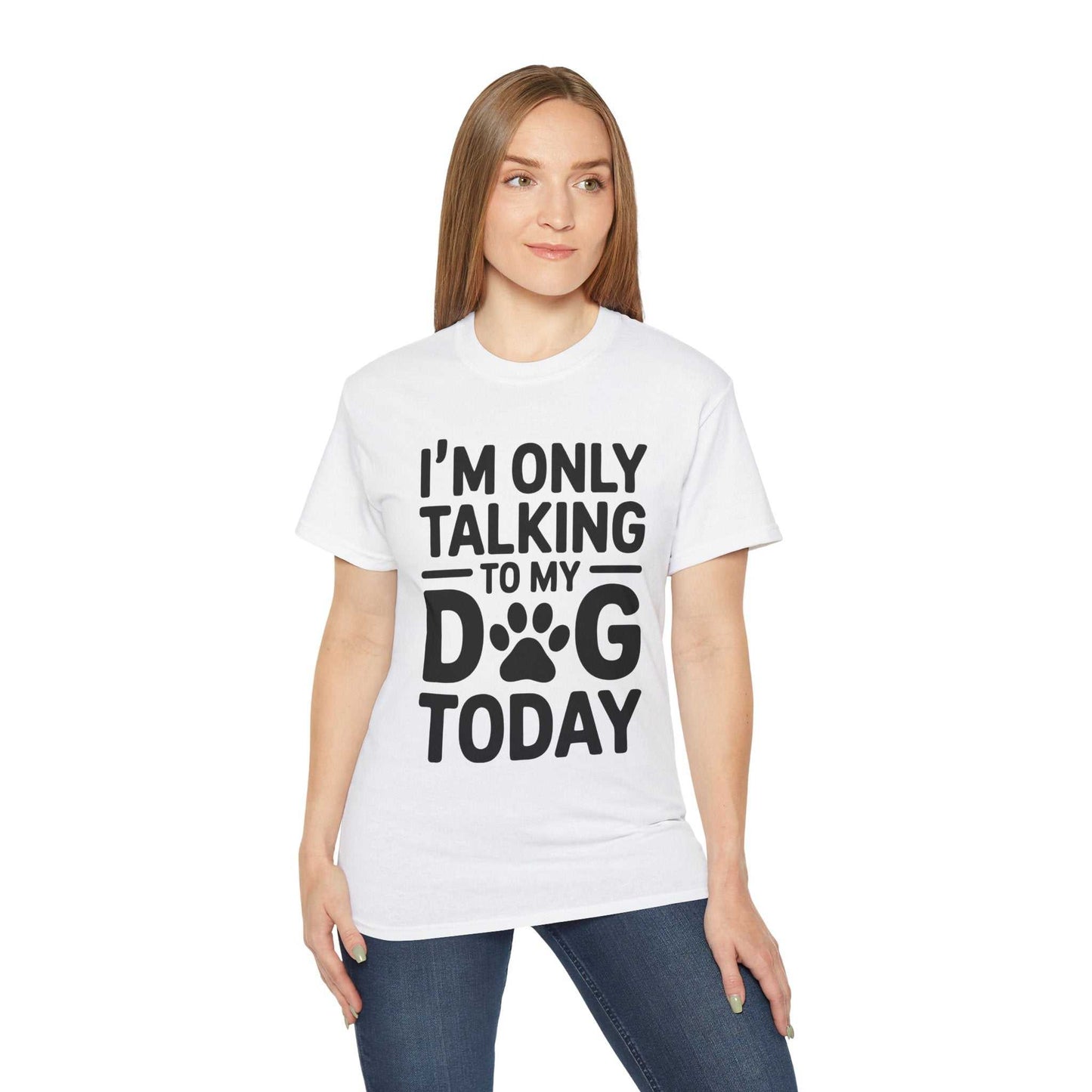 Woman wearing a white t-shirt with 'I'm only talking to my dog today' text.