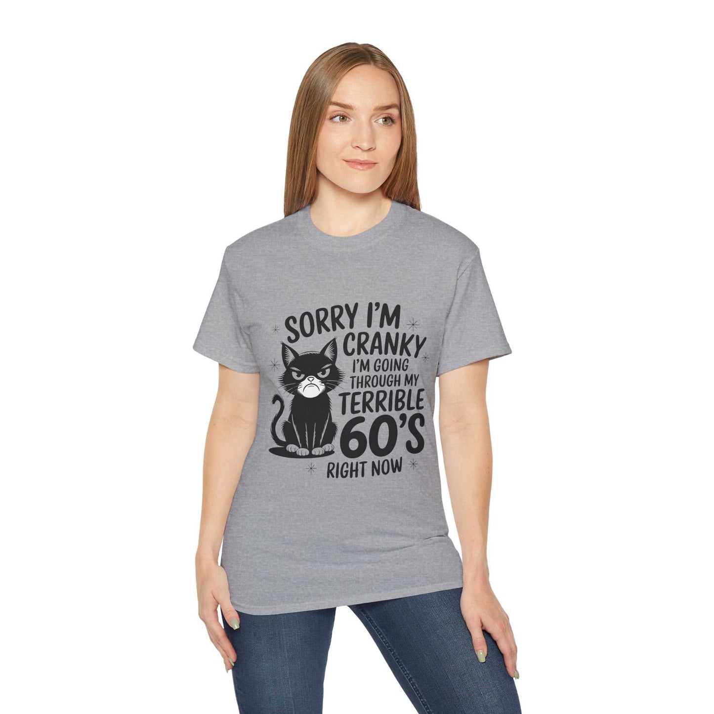 Person wearing a gray t-shirt with a cat graphic and text on a white background