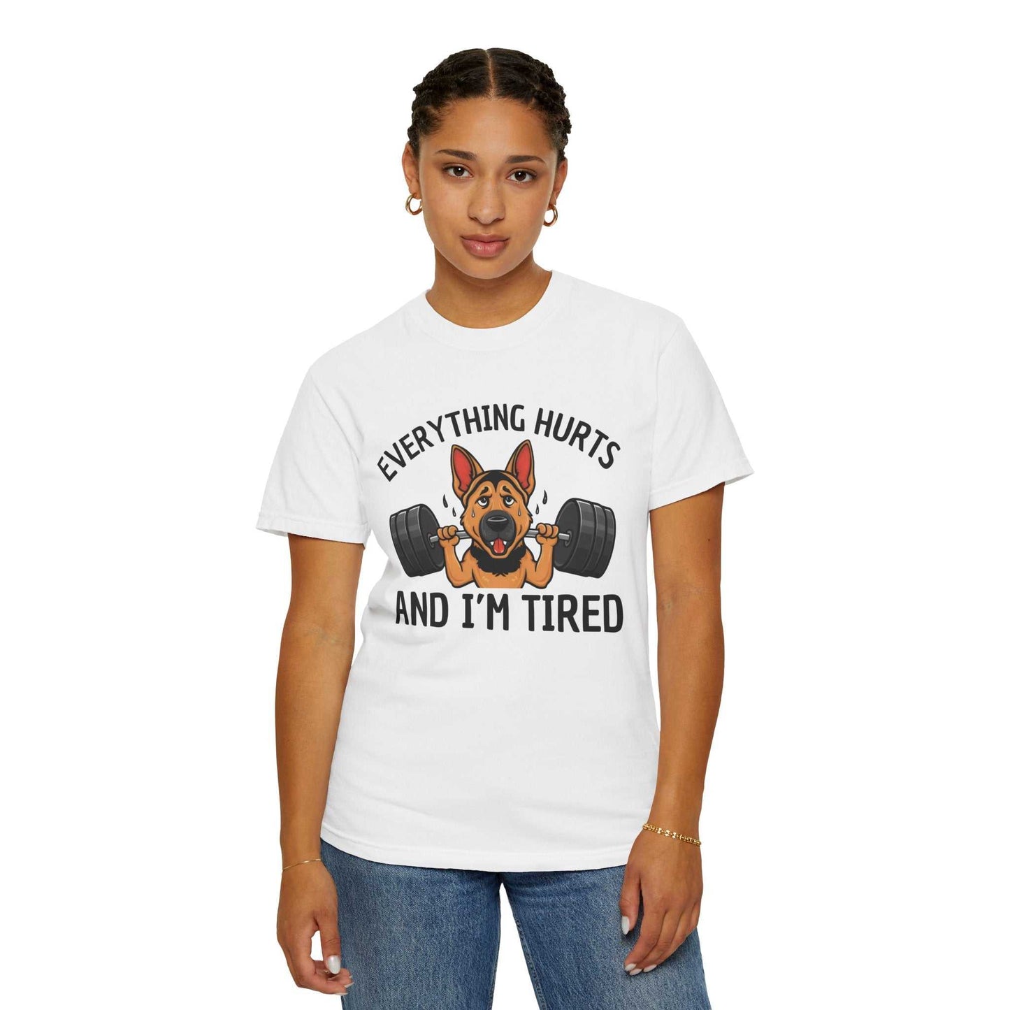Person wearing a white t-shirt with a dog graphic and text on a white background