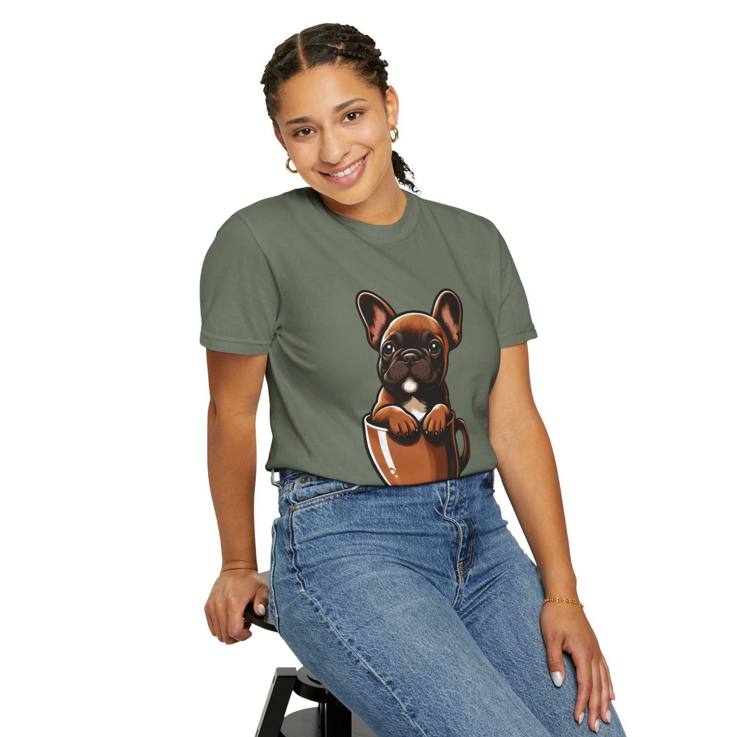 Person wearing a green t-shirt with a dog graphic design on a white background