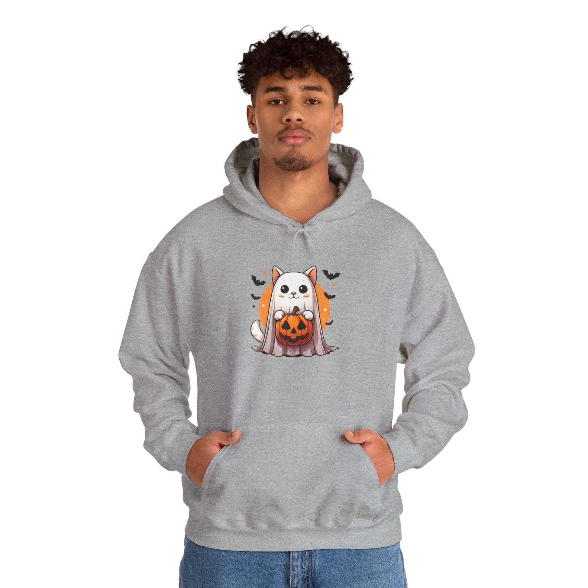 Person wearing a gray hoodie with a Halloween-themed design on a white background