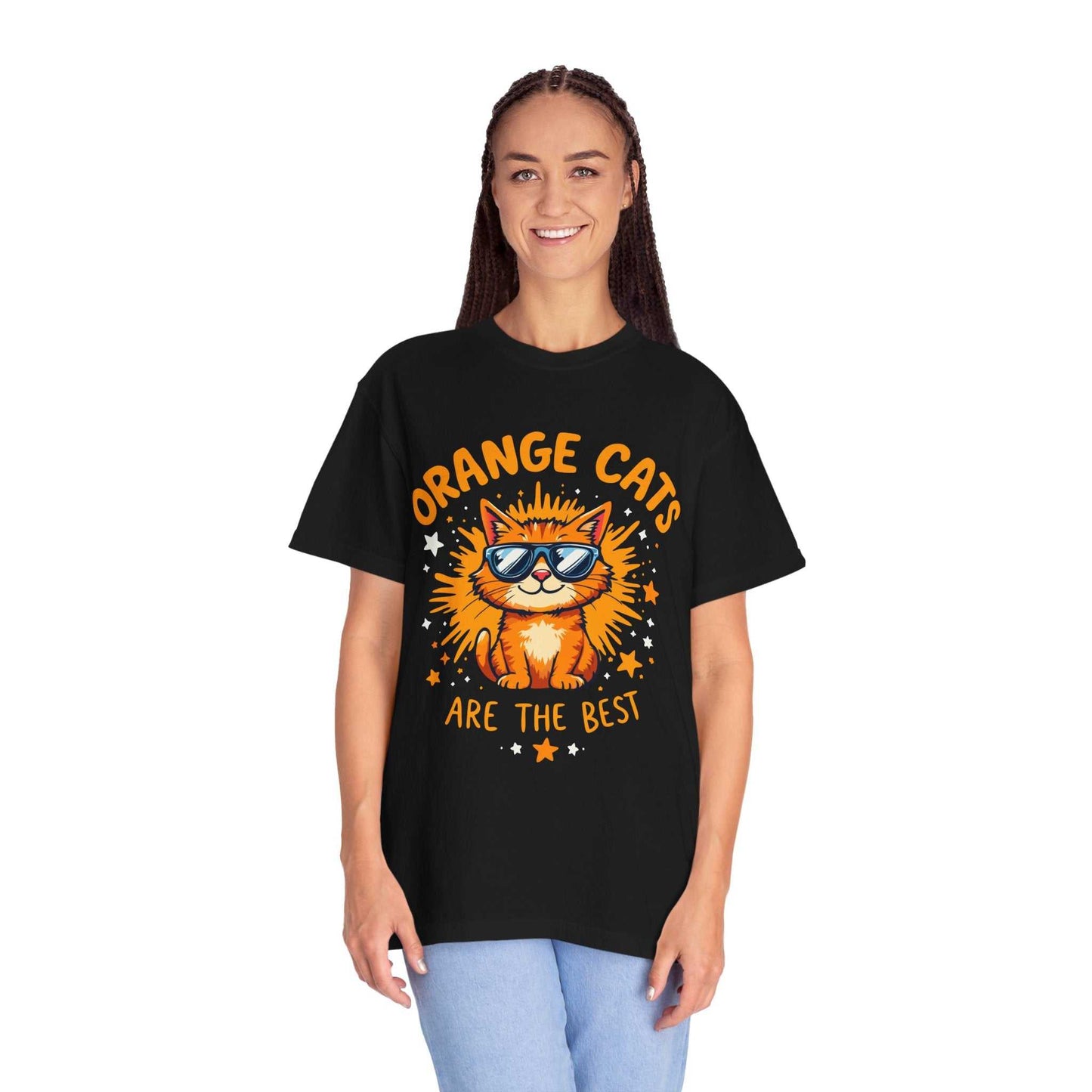Person wearing a black t-shirt with an orange cat graphic and text on a white background