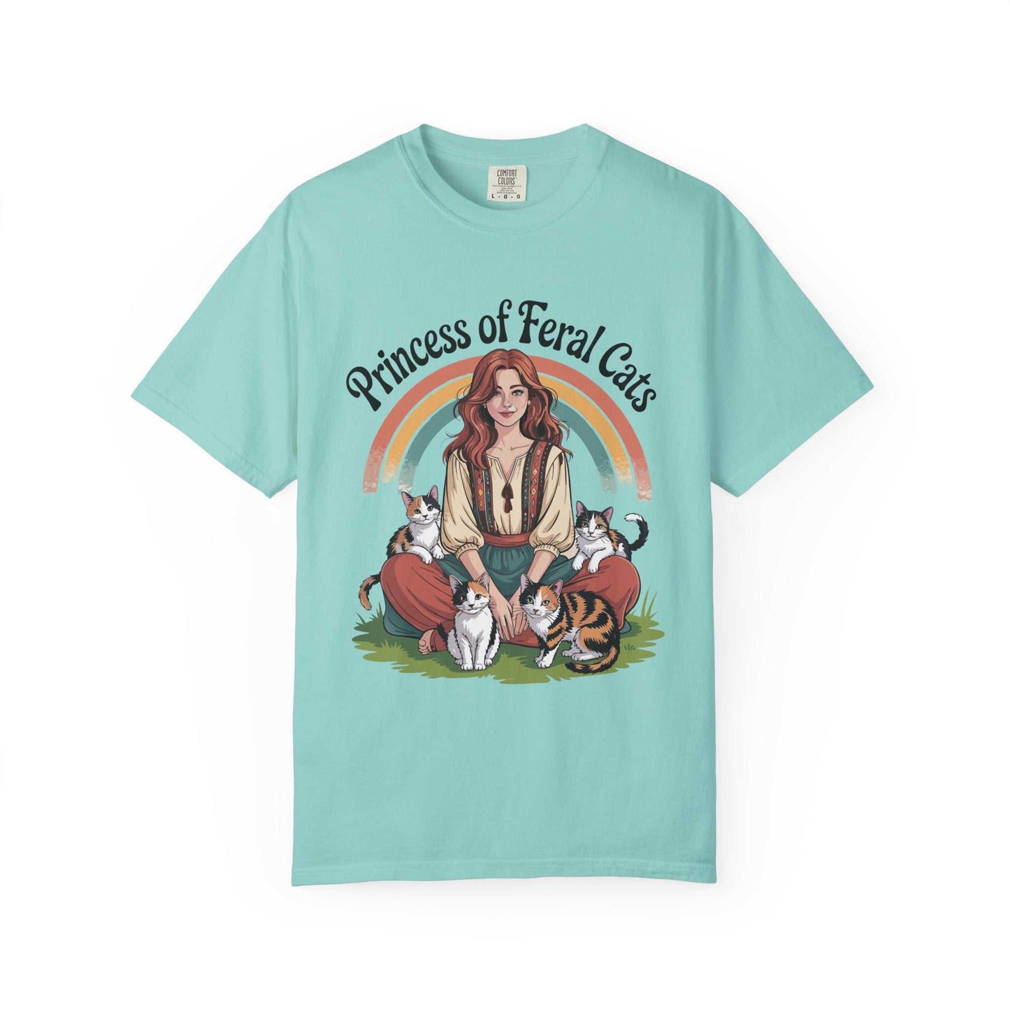 Light blue t-shirt with a graphic of a woman surrounded by cats and a rainbow, with 'Princess of Feral Cats' text.