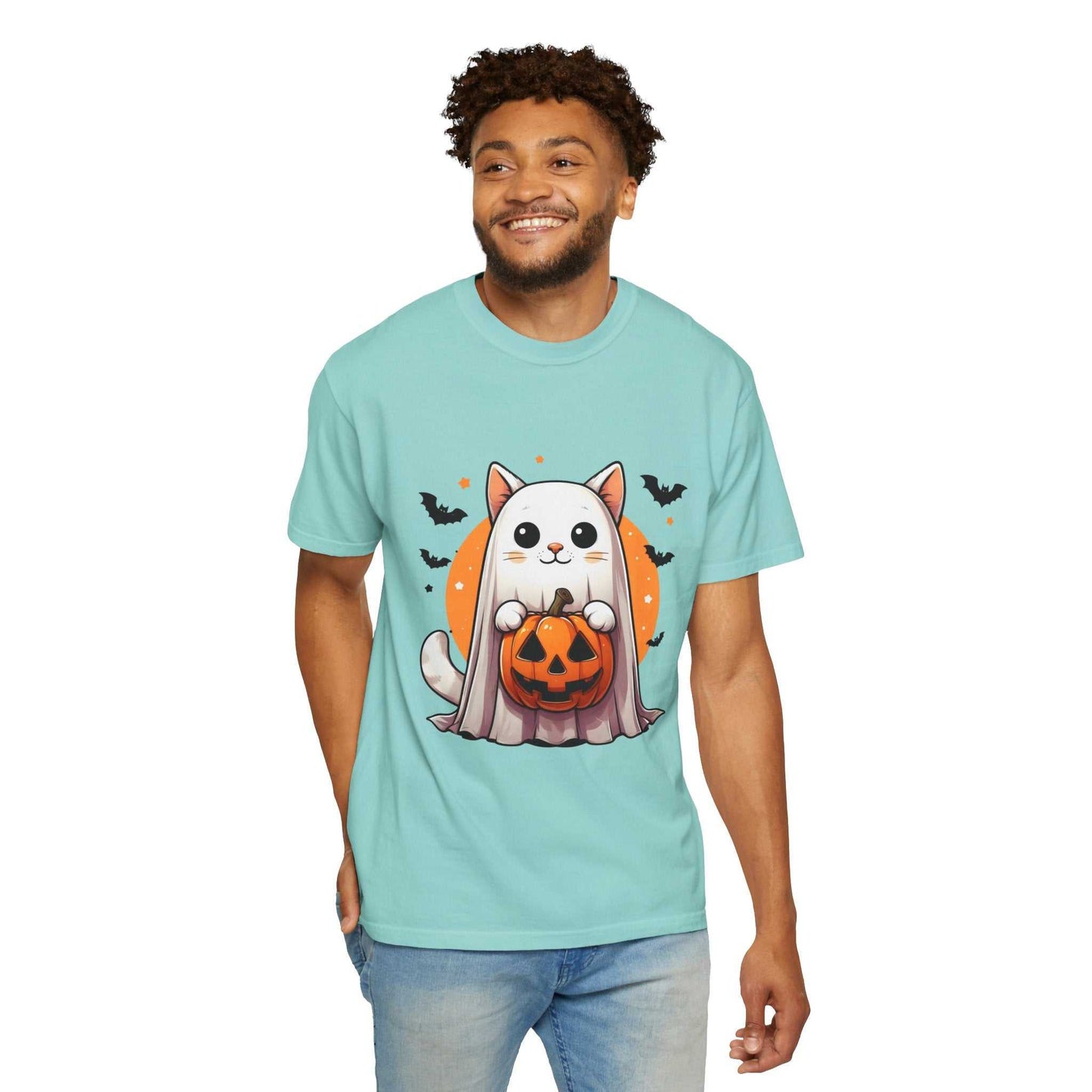Man wearing a light blue t-shirt with a Halloween-themed graphic of a cat and pumpkin.