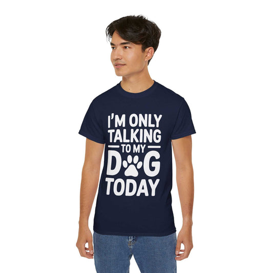 Person wearing a navy blue t-shirt with white text and paw print on a white background