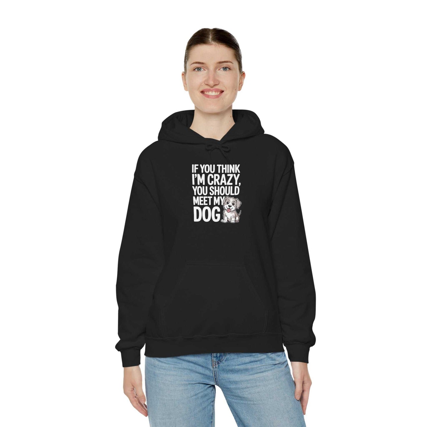 Person wearing a black hoodie with text and a graphic, standing against a white background