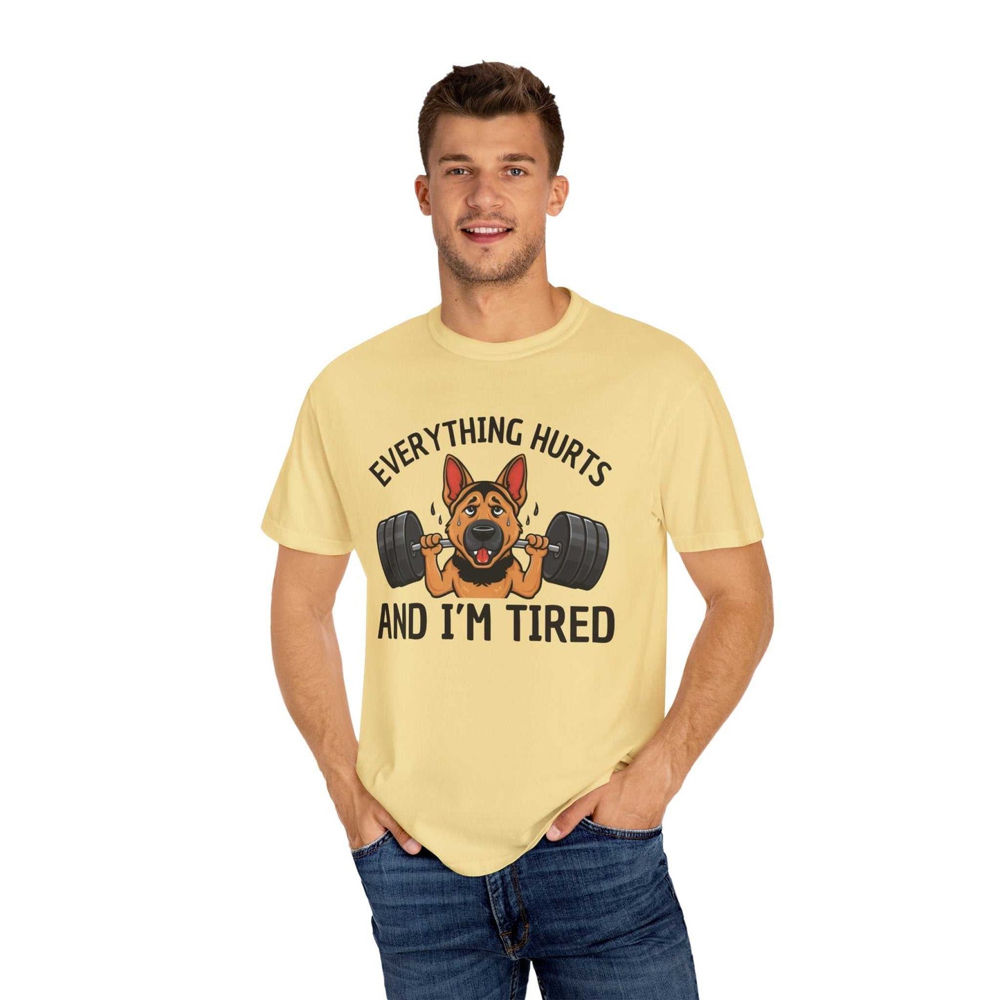 Man wearing a yellow t-shirt with a dog graphic and text on a white background