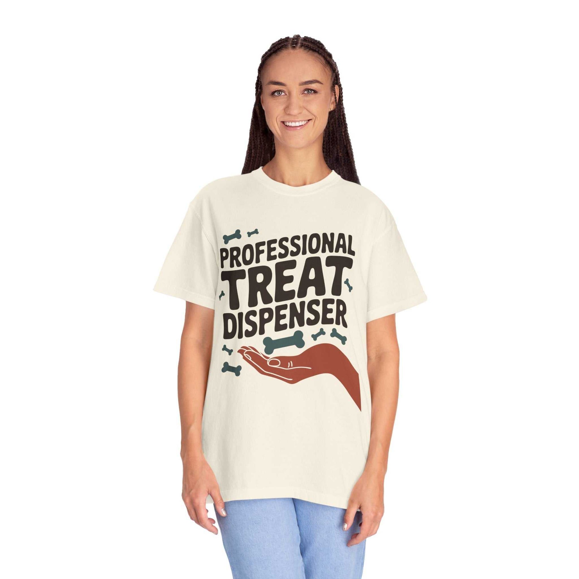 Person wearing a cream t-shirt with 'Professional Treat Dispenser' text and graphic on a white background