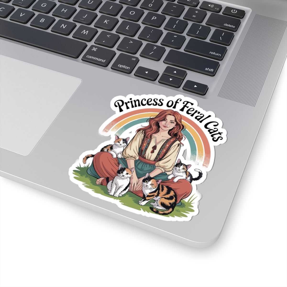 Sticker of a woman with cats on a laptop
