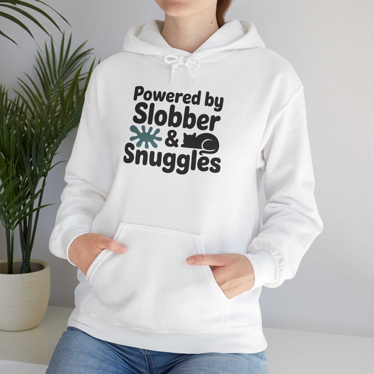 White hoodie with 'Powered by Slobber & Snuggles' text and graphic, worn by a person.
