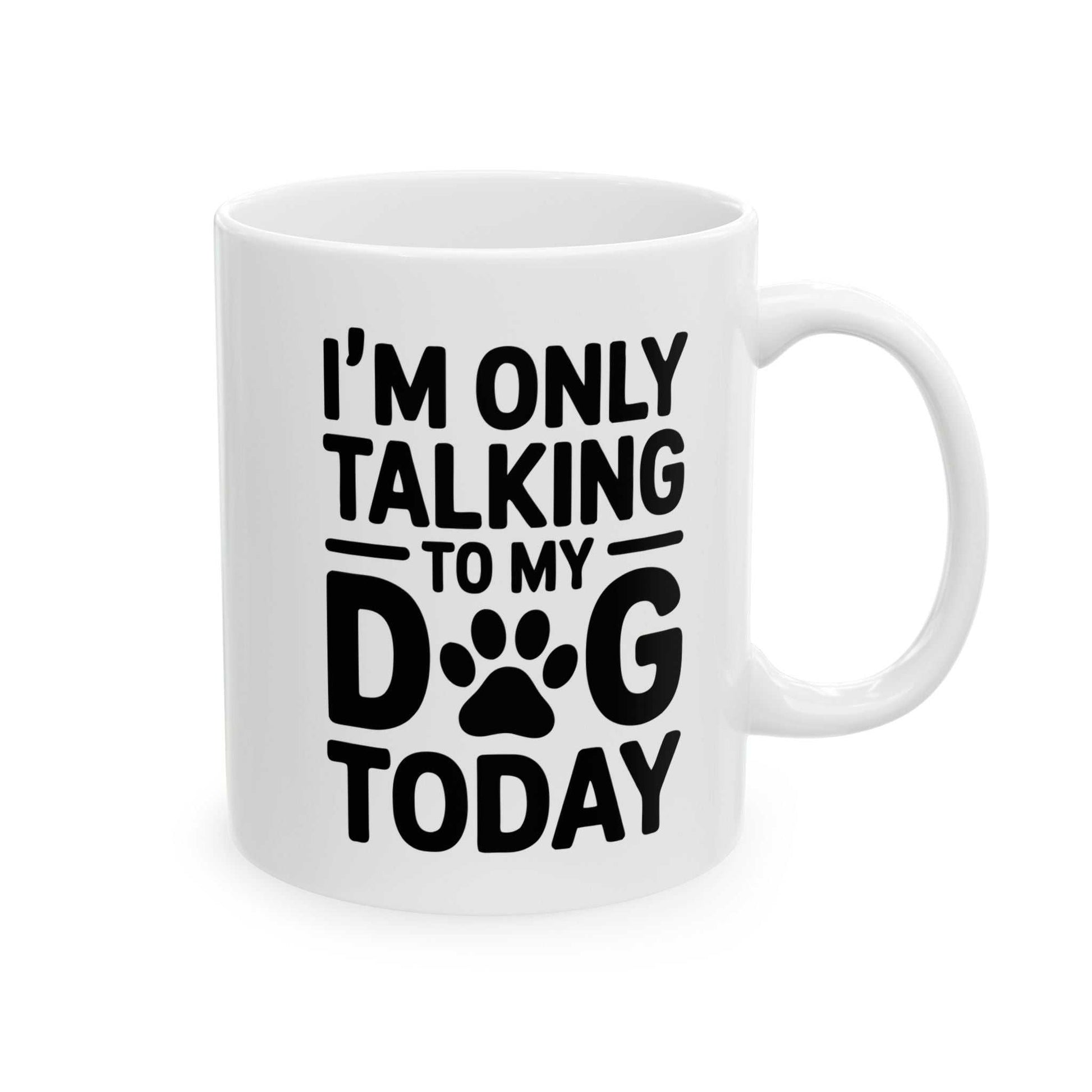 White mug with black text 'I'm only talking to my dog today' on a white background