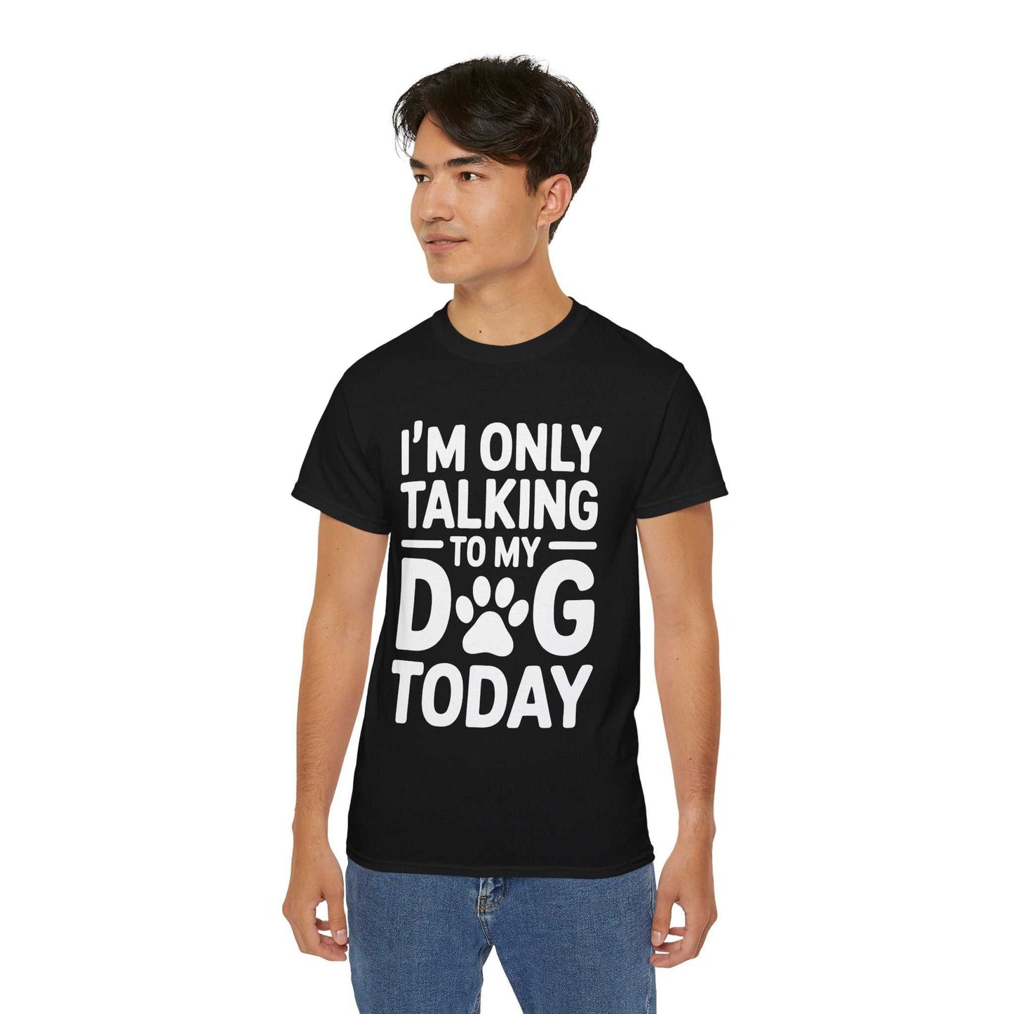 Person wearing a black t-shirt with 'I'm only talking to my dog today' text on a white background