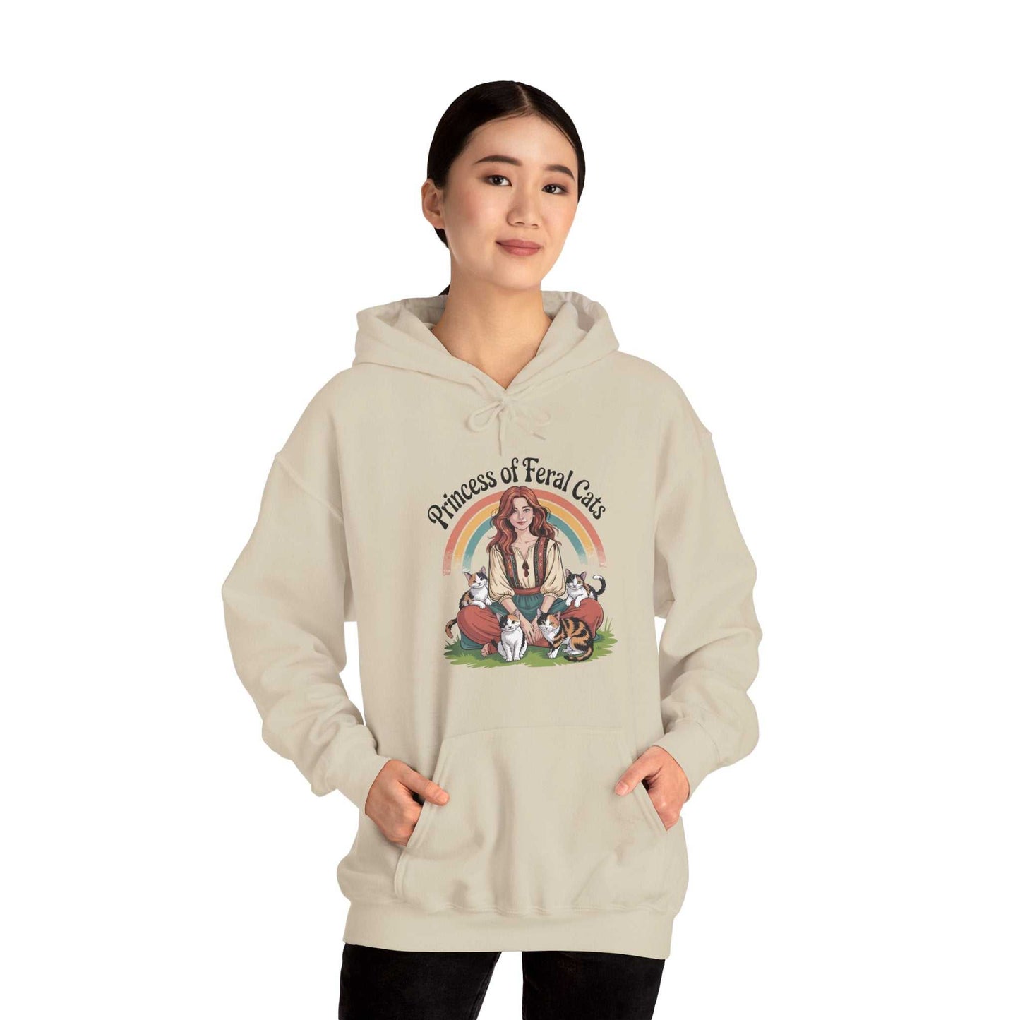 Person wearing a beige hoodie with a graphic design on a white background